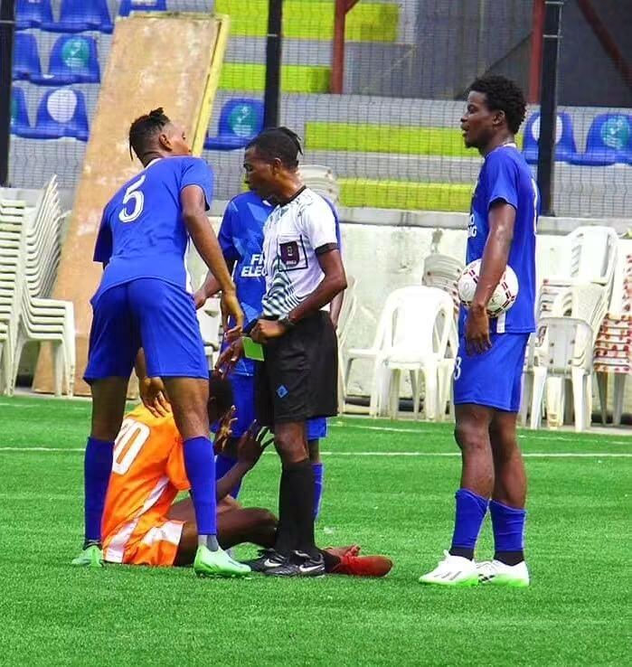 Referee Attends To Injury — G12 Football Club Matchday, Lagos Island