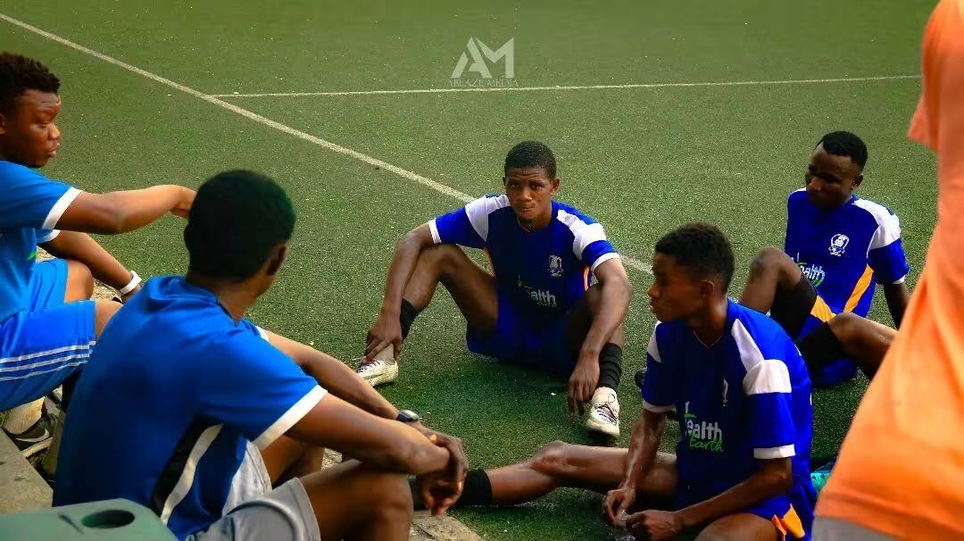 Cooling Down On The Grass — G12 Football Club Training, Lagos Island